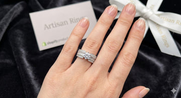 Elegant Round-Cut Diamond Halo Engagement Ring with Double Baguette Band