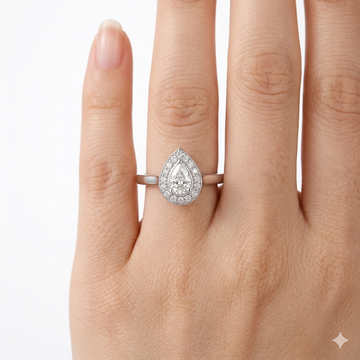 Timeless Pear Halo Ring: Brilliance Cut Zircon in Polished Rhodium Finish