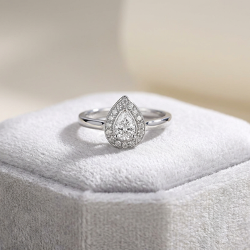 Timeless Pear Halo Ring: Brilliance Cut Zircon in Polished Rhodium Finish