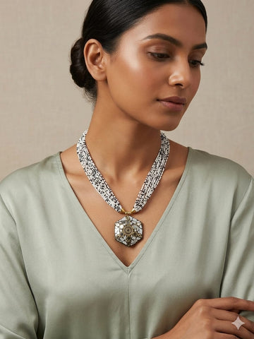 Elegant Handcrafted Multi-Strand Beaded Necklace with Geometric Statement Pendant